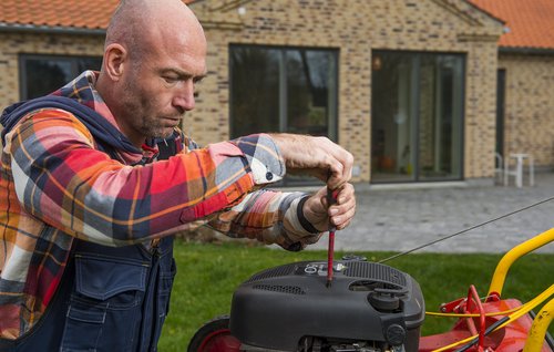Beskyttelseskappe skrues af