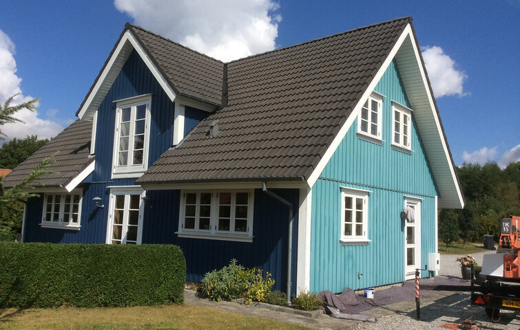træhus malet blå