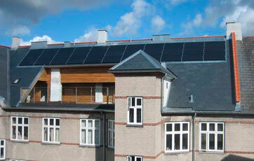 Selvom du ikke bor i hus, kan du godt anskaffe dig solceller. Det kan du gøre i fællesskab med din andels-, bolig- eller ejerforening. Foto: Kristian Sylvester Hvid